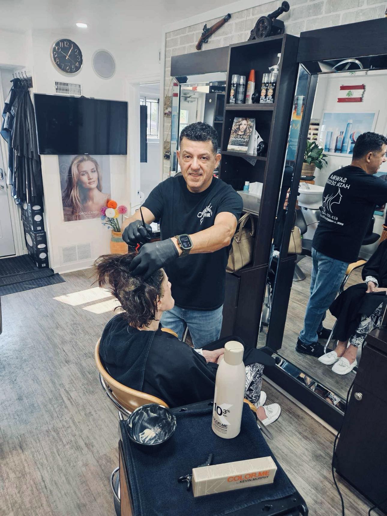 Stylist working with a salon client